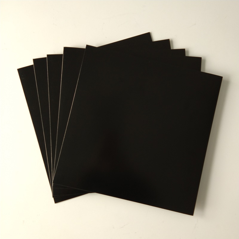 12 zwarte kartonnen platenhoezen met gat