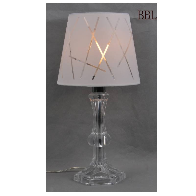 Tafellamp met wasschaduw en transparante behuizing van acryllamp