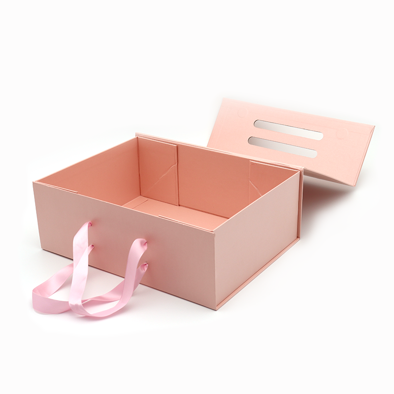 Aangepaste logo gedrukt vouwen papier platte pak cosmetische gift verpakking roze magnetische dozen met handvat