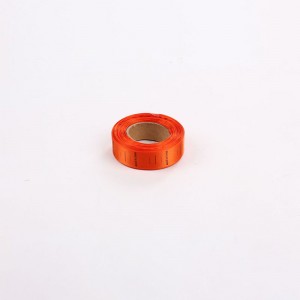 Kleurrijk geweven kledingetiket