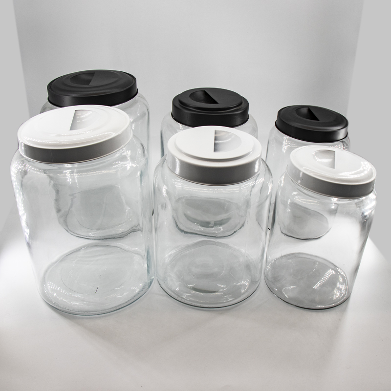 Groothandel glas voedsel opslag canners potten instellen met metalen deksels voor de keuken