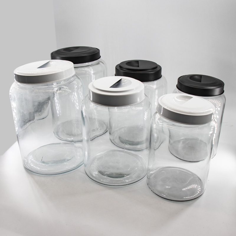 Groothandel glas voedsel opslag canners potten instellen met metalen deksels voor de keuken