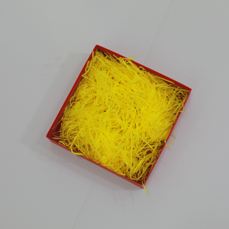 Geel vulling crinkle versnipperd papier