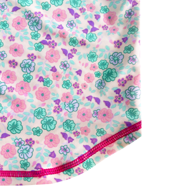 Bloemenontwerp kleur contrast stevige kleur baby zwempak top