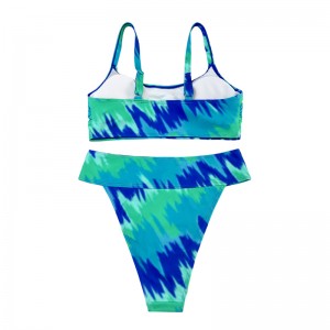 Turquoise gedrukt tweedelig met brede riemen