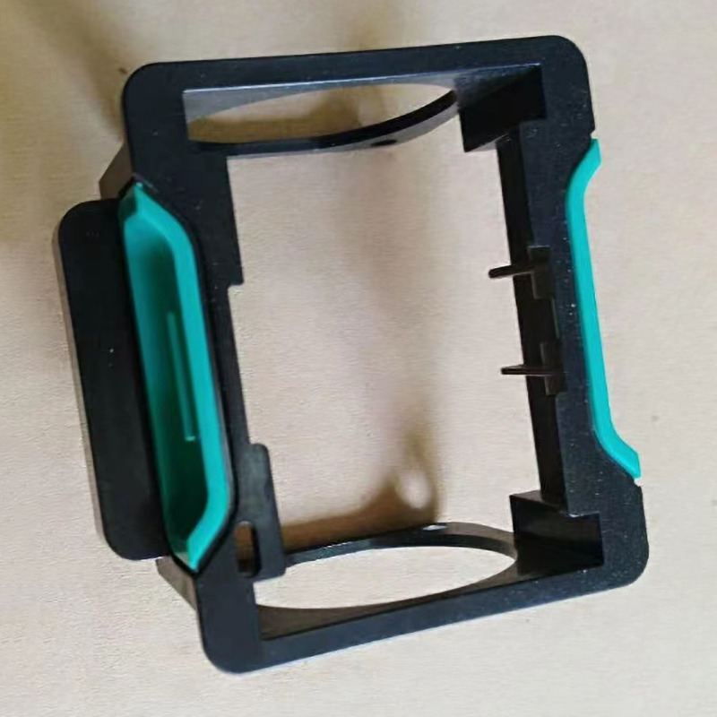 Tweekleurige kunststof onderdelen