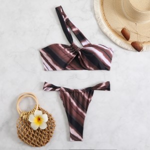 Twee-stuk zwempak. Sexy een-Schouderstrapless bikini met een backless ontwerp. Europese en Amerikaanse stijl Buitenlandse handelswogkleding voor groothandel QT-25018 Prijs:$79.99